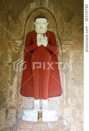 Buddha statue at ancient temple in Bagan, Myanmar Buddha statue at ancient temple in Bagan, Myanmar 36359790