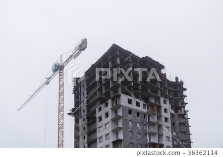 Construction of houses in winter. Severe weather 36362114