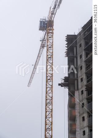 Construction of houses in winter. Severe weather 36362115