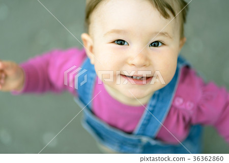 Nice joyful baby looking up 36362860
