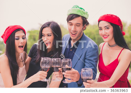 Young people are celebrating New Year's party. 36363963