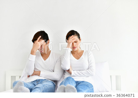 A couple lover is upset about something in the bedroom. 36364071