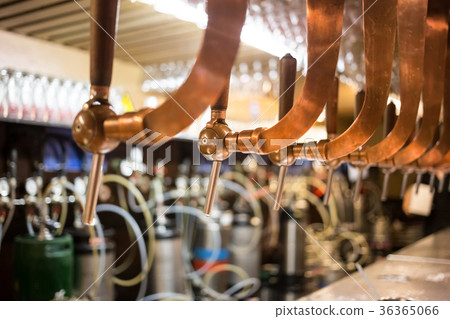 Beer bar pub tap, counter with blur pub background 36365066