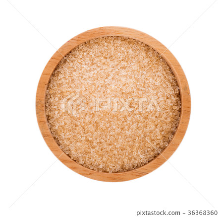 Brown sugar in wooden bowl on white background 36368360