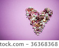 collection of Pink glass beads shaped into a heart 36368368