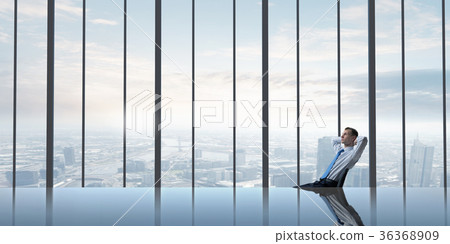 Man in panoramic office Man in panoramic office 36368909