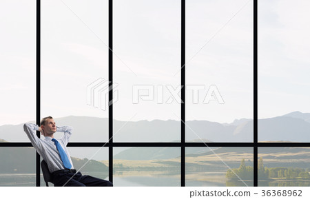 Man in panoramic office Man in panoramic office 36368962