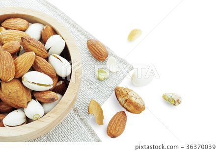 Many almonds on white background. Many almonds on white background. 36370039