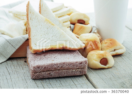 Many breads on wooden. Many breads on wooden. 36370040