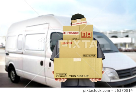 Delivery man carry parcel boxes 36370814
