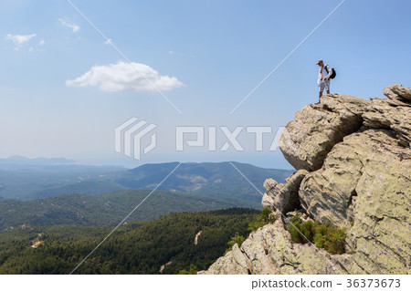 Tourist man on top of high mountains of peninsula 36373673