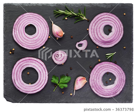 Sliced red onions set on black Sliced red onions set on black 36373798