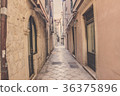Narrow aisle between old building in Dubrovnik. 36375896