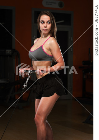 Sexy fitness woman posing in gym 36377416