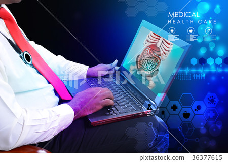 Doctor with stethoscope and laptop Doctor with stethoscope and laptop 36377615