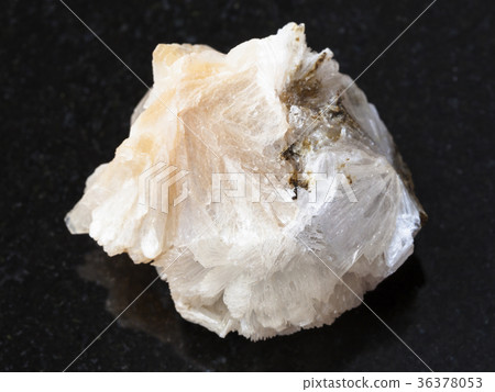 raw Thomsonite stone on dark background 36378053