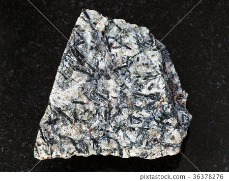 raw lujavrite stone on dark background raw lujavrite stone on dark background 36378276