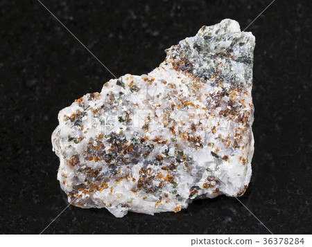 chondrodite and diopside in rough calcite stone 36378284