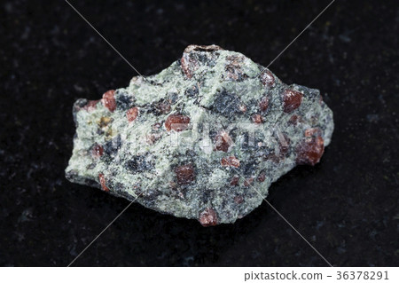 raw eclogite stone on dark g background 36378291