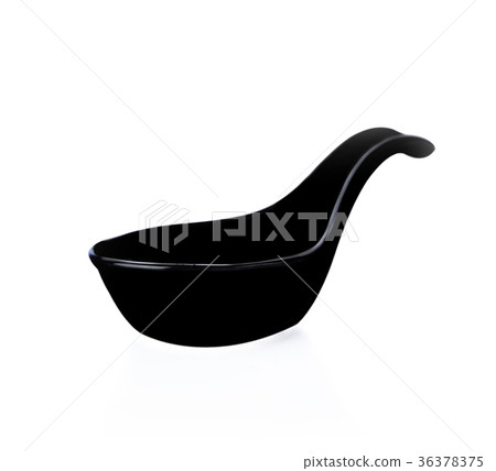 Empty ceramic black spoon on white background 36378375