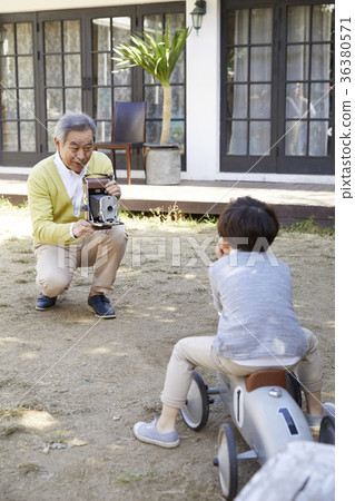 Grandfather, grandson, minicar, toy Grandfather, grandson, minicar, toy 36380571