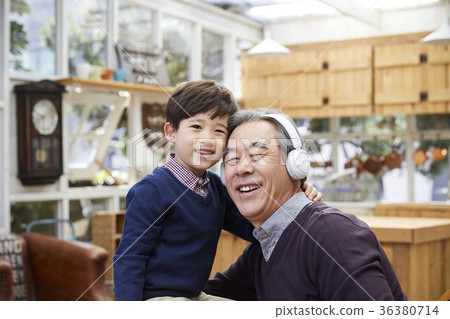 Grandfather, grandson, listening to music Grandfather, grandson, listening to music 36380714