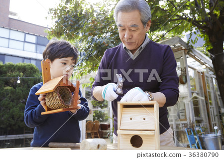 Grandfather, grandson, new house, making 36380790