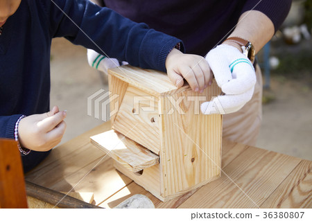 Grandfather, grandson, new house, making 36380807