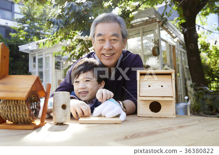 Grandfather, grandson, new house, making 36380822
