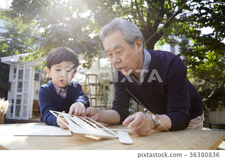 Grandfather, grandson, making 36380836