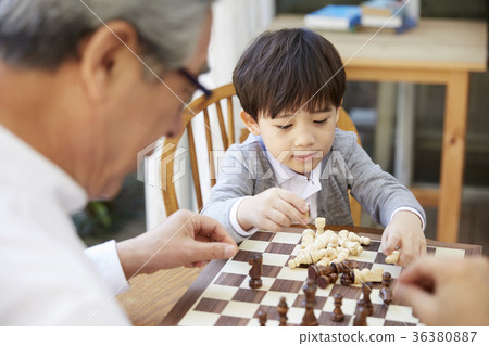 Grandfather, grandson, chess Grandfather, grandson, chess 36380887