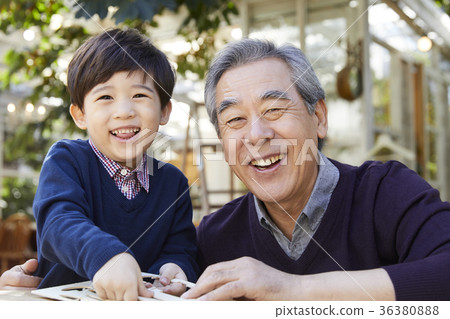 Grandfather, grandson, making 36380888