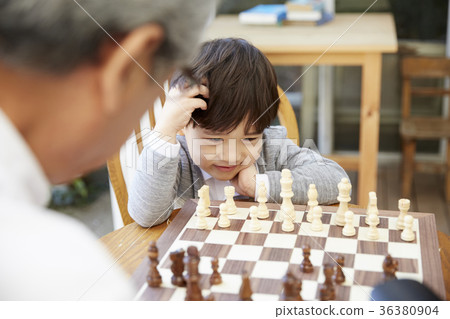 Grandfather, grandson, chess Grandfather, grandson, chess 36380904