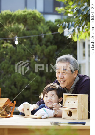 Grandfather, grandson, new house, making 36381129