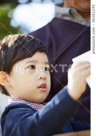 Grandfather, grandson, new house, making 36381245