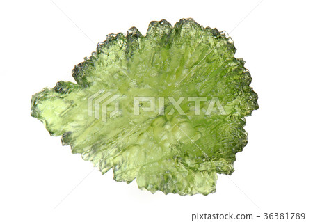 green moldavite mineral isolated 36381789