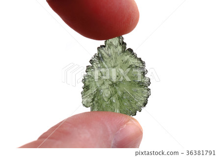 green moldavite mineral isolated 36381791