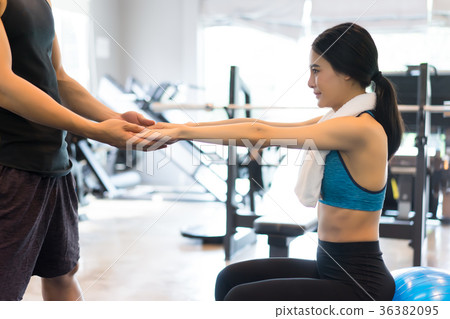 Beautiful sports girl is exercises with fit ball Beautiful sports girl is exercises with fit ball 36382095