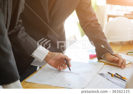 Two business Engineer discussing meeting. Two business Engineer discussing meeting. 36382135