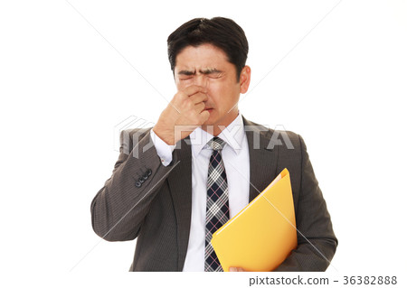 A man picking his nose A man picking his nose 36382888