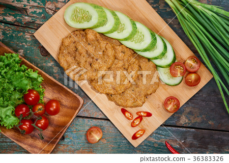Vietnam fried fish patty with vegetable and sauce. Vietnam fried fish patty with vegetable and sauce. 36383326
