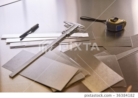 Engineer's tools on the table. 36384182