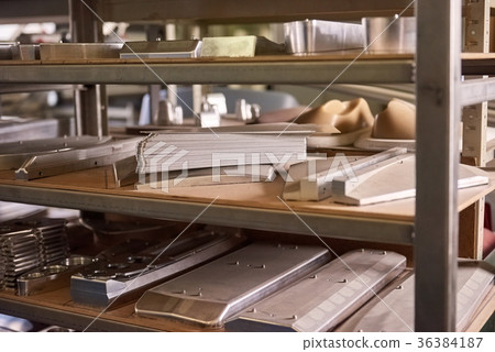 Steel parts on shelves. Steel parts on shelves. 36384187