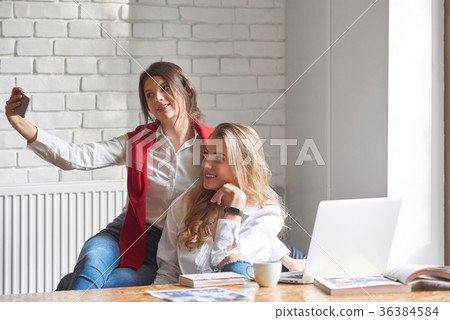 Two female friends at the cafe 36384584