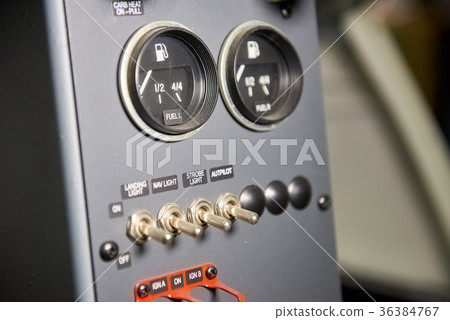Airplane dashboard, fuel indicator. 36384767