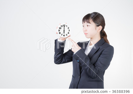 Business woman and clock (6 o'clock) 36388396