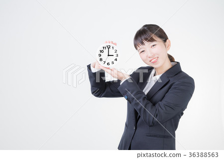 Business woman and watch (3 o'clock) Business woman and watch (3 o'clock) 36388563