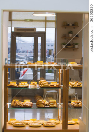 Lots of baking products in the shop window 36390830