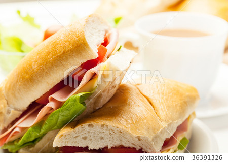 Italian panini sandwich with ham, cheese and tomato Italian panini sandwich with ham, cheese and tomato 36391326