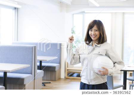 Woman dressed in work clothes 36391562